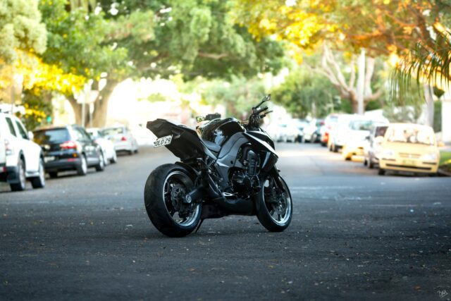 Motorcycle in the street with short number plates