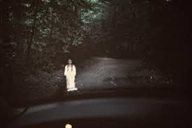 Creepy woman in the road