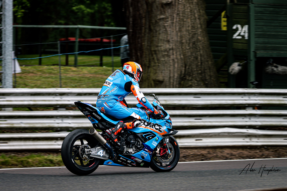 Linfoot riding motorcycle